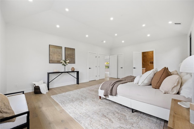 bedroom featuring light hardwood / wood-style floors