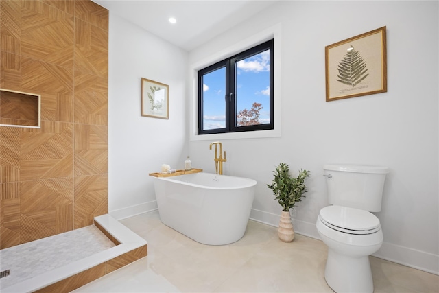 bathroom featuring toilet and a bathing tub