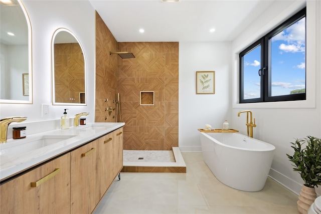 bathroom with vanity, tile patterned floors, and independent shower and bath