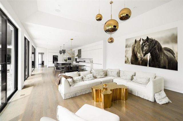 living room with light hardwood / wood-style floors