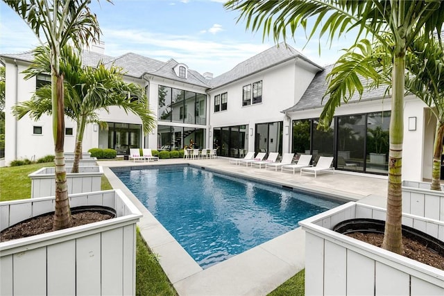 view of pool featuring a patio