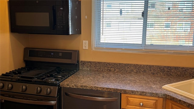 kitchen featuring stainless steel appliances and sink