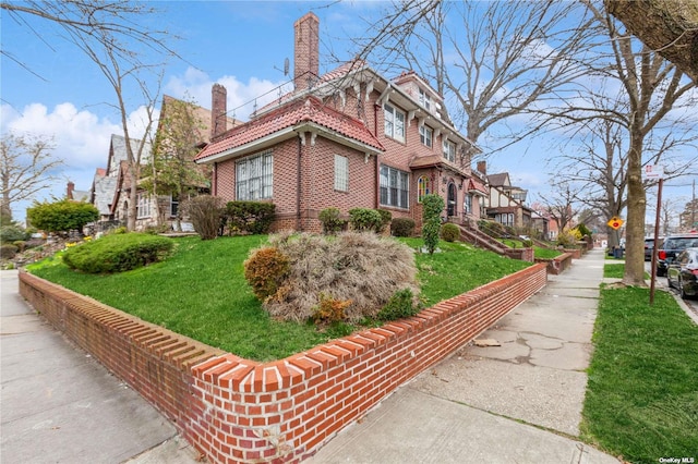 view of property exterior with a yard