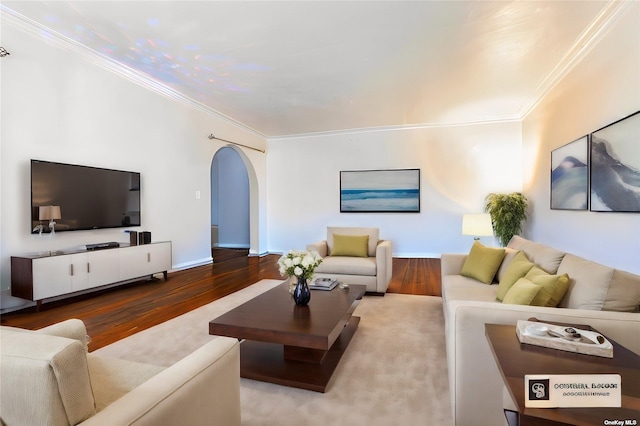 living room featuring hardwood / wood-style flooring and crown molding