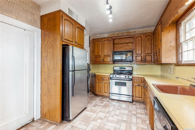 kitchen featuring sink and appliances with stainless steel finishes