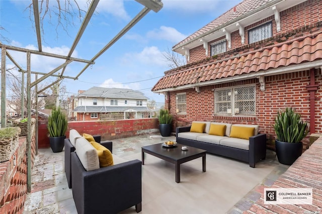 view of patio / terrace featuring a pergola and outdoor lounge area