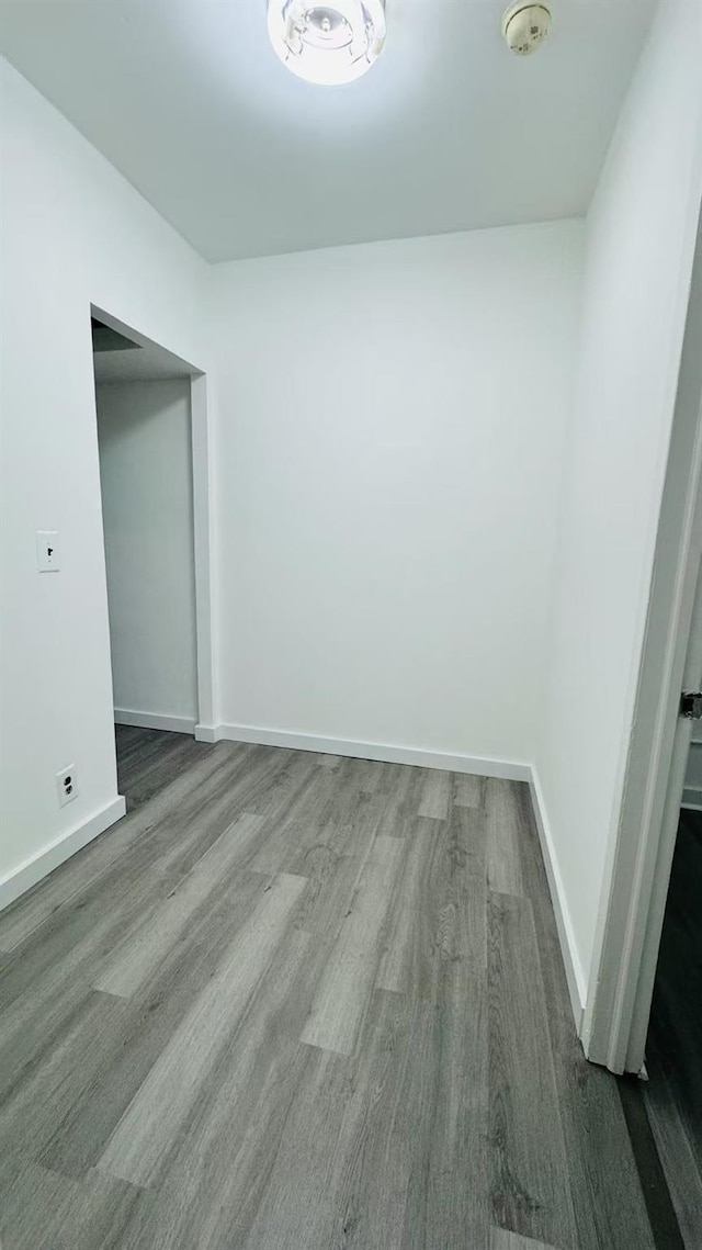 empty room featuring hardwood / wood-style flooring