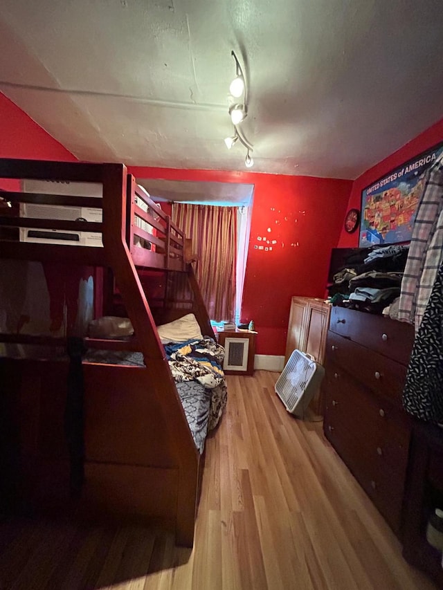 bedroom with light wood-type flooring