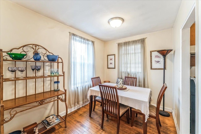 dining area featuring hardwood / wood-style floors