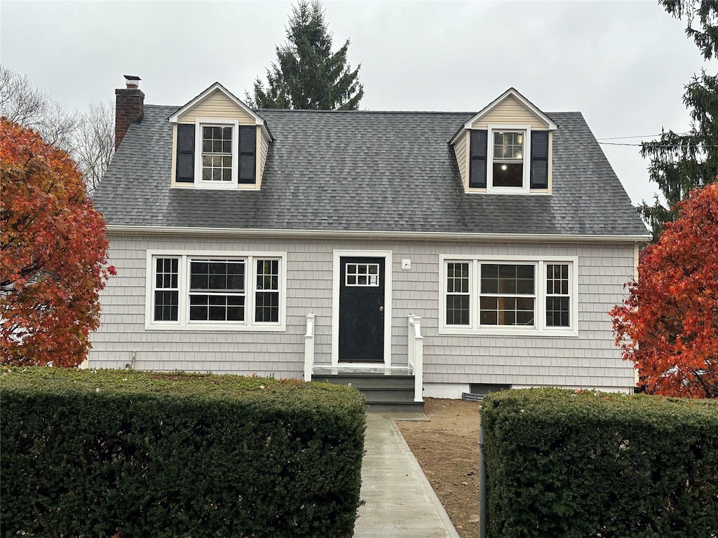 view of new england style home