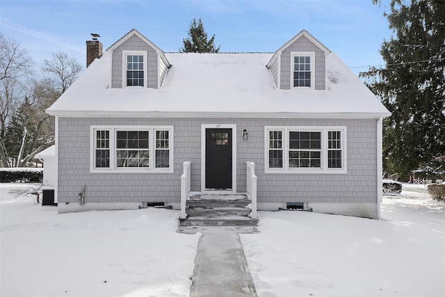 view of new england style home