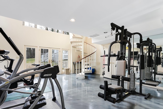 gym with french doors