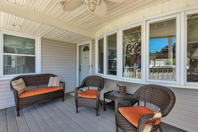 wooden deck with ceiling fan