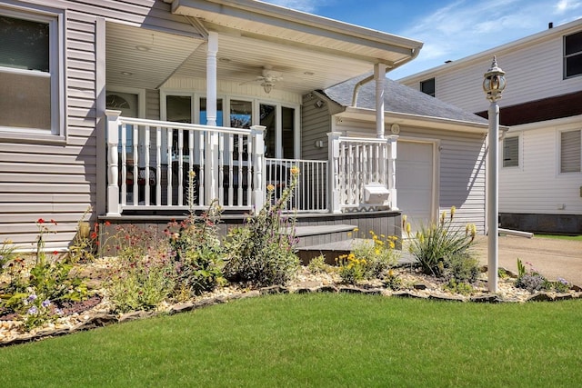 exterior space featuring ceiling fan and a lawn