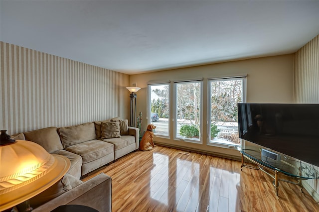 living room with light hardwood / wood-style floors