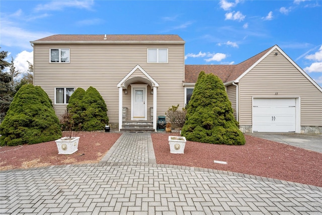 front facade with a garage