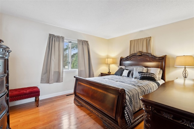 bedroom featuring light hardwood / wood-style floors