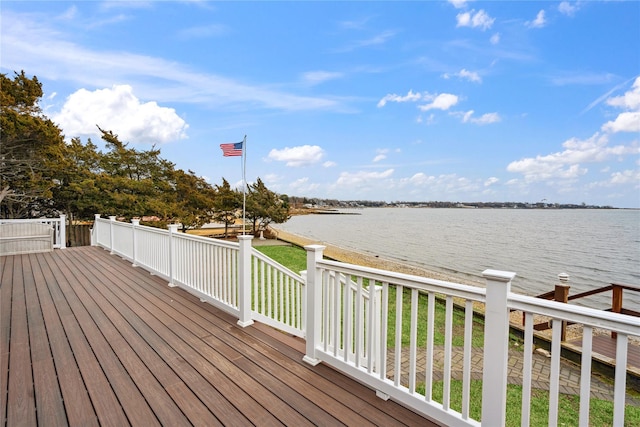 wooden deck with a water view