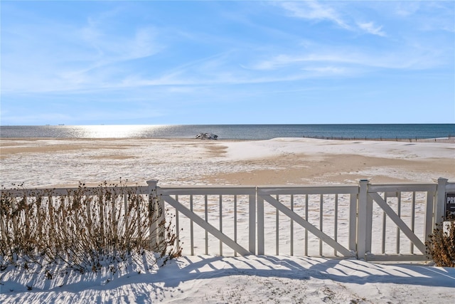 view of water feature with a beach view