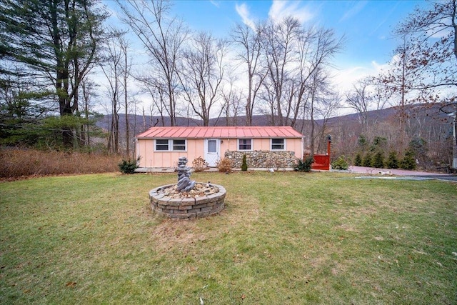 ranch-style house with a front lawn