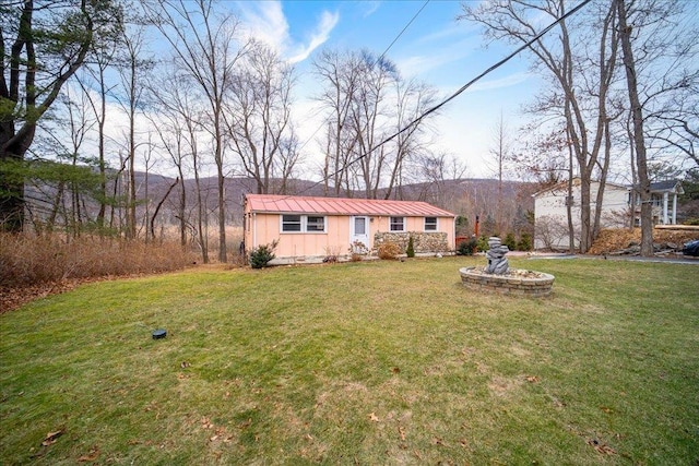 view of front of property with a front yard