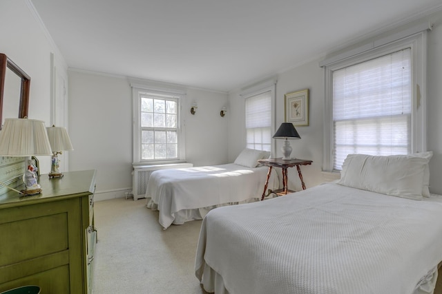 bedroom with ornamental molding, radiator, and light carpet