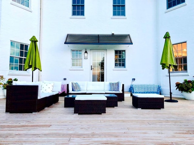 deck with an outdoor hangout area