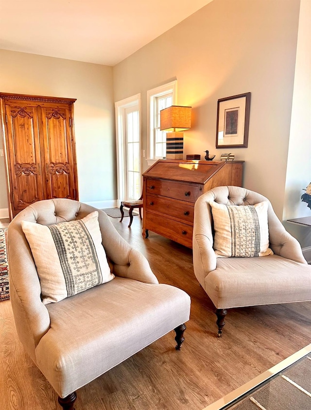 sitting room featuring light hardwood / wood-style flooring