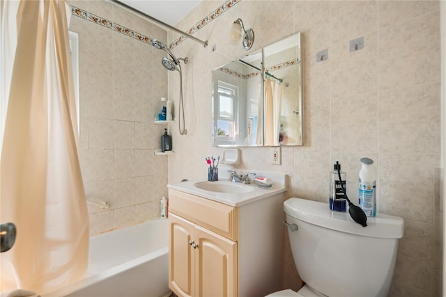 full bathroom with shower / tub combo with curtain, tile walls, toilet, backsplash, and vanity