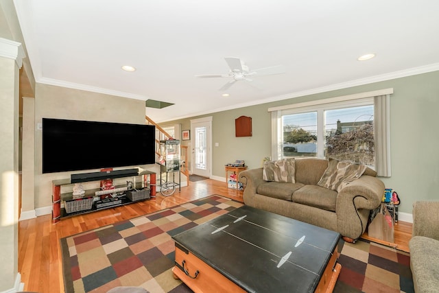 living room featuring crown molding, dark hardwood / wood-style floors, and ceiling fan