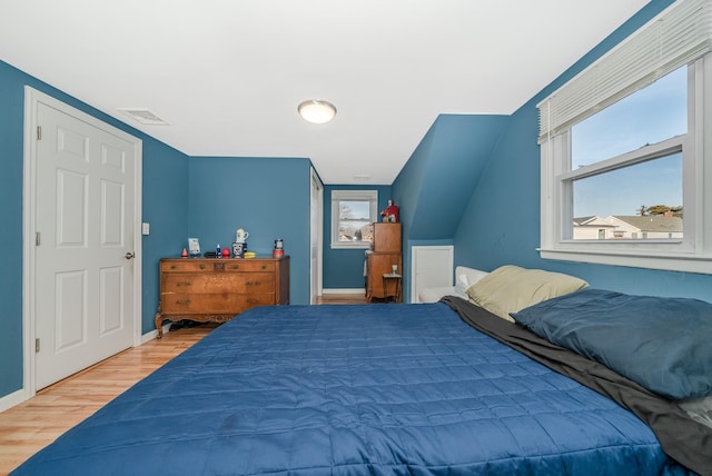 bedroom featuring hardwood / wood-style floors