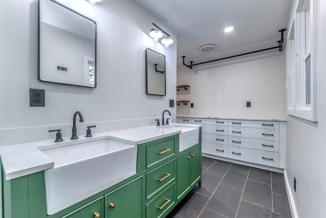 bathroom featuring vanity and tile patterned flooring