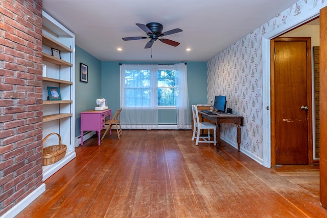 office space featuring hardwood / wood-style flooring and ceiling fan