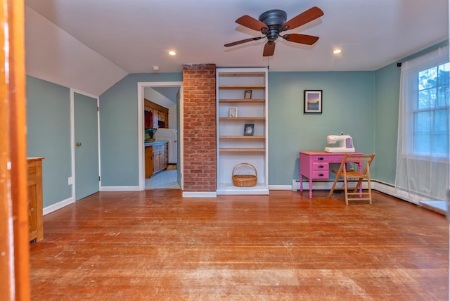 game room with vaulted ceiling, ceiling fan, and light wood-type flooring