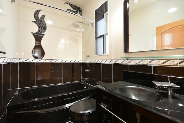 full bathroom with tasteful backsplash, vanity, toilet, and shower / bath combination