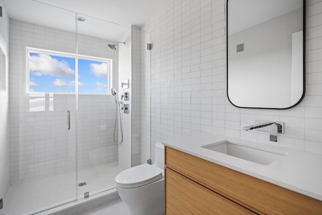 bathroom with toilet, walk in shower, tasteful backsplash, tile walls, and vanity