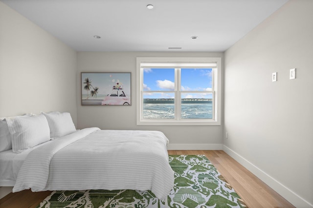 bedroom featuring hardwood / wood-style flooring