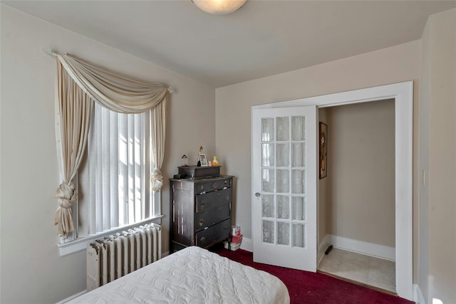 bedroom featuring radiator