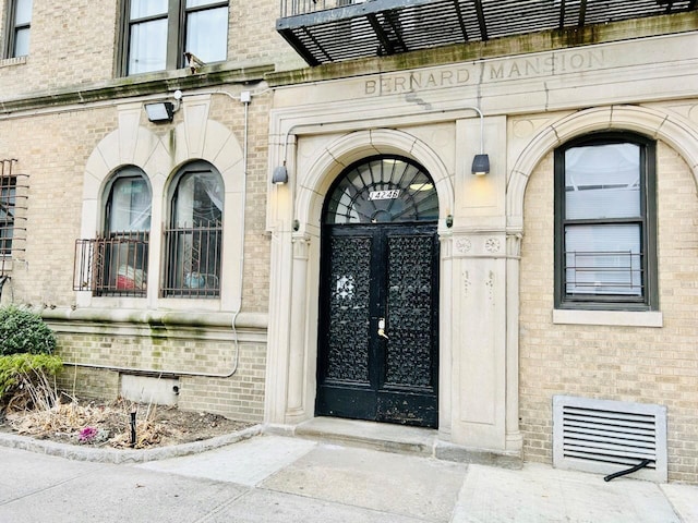 property entrance featuring french doors