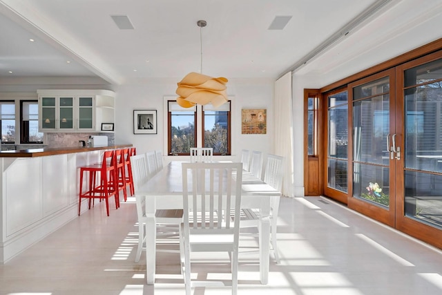 dining area featuring french doors