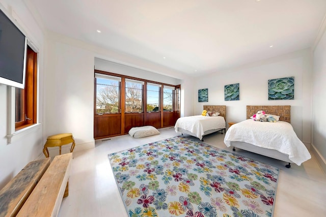 bedroom featuring light wood-type flooring