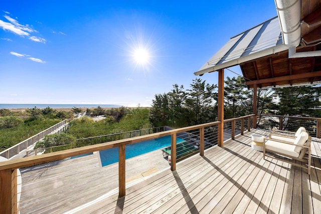 deck featuring a water view