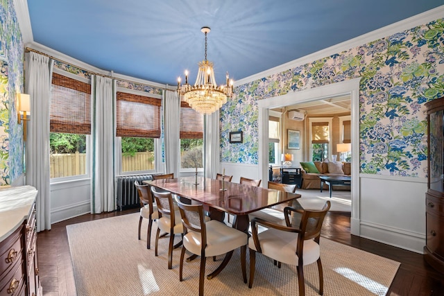 dining room with an AC wall unit, radiator, dark hardwood / wood-style floors, ornamental molding, and a chandelier