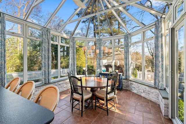 sunroom with a chandelier