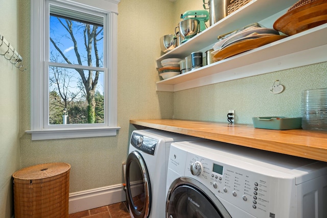 laundry area with separate washer and dryer