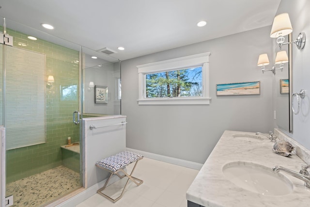 bathroom featuring walk in shower and vanity