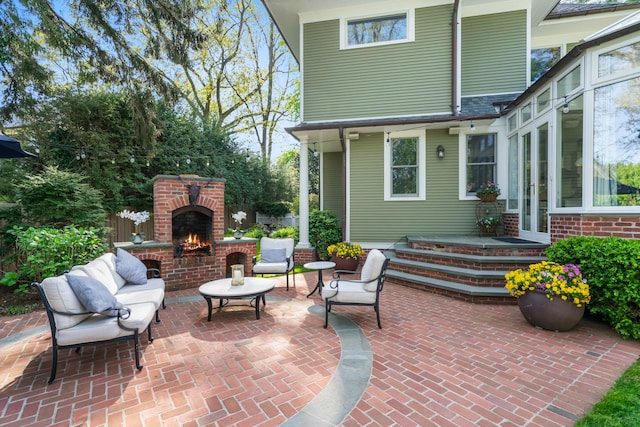 view of patio / terrace with an outdoor brick fireplace