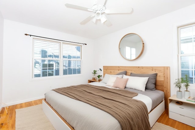 bedroom featuring ceiling fan and light wood-type flooring