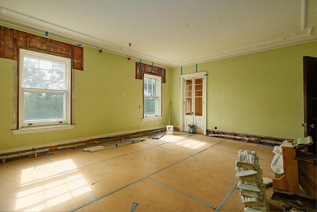 spare room with crown molding