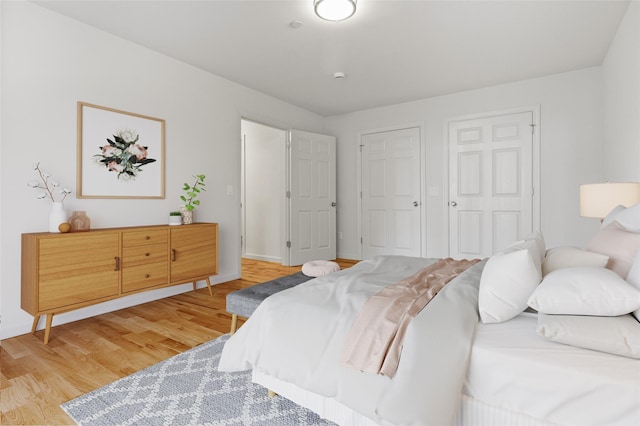 bedroom featuring light wood-style flooring